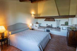 Giường trong phòng chung tại Tenuta La Veduta +67 ảnh