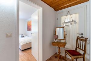 Postel nebo postele na pokoji v ubytování Haus Am Waldrand