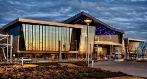 a large building with a street light in front of it at Classen Craftsman-near Asian & Paseo district in Oklahoma City