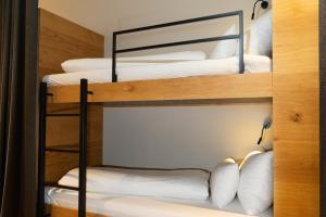 Двухъярусная кровать или двухъярусные кровати в номере Heimat 1495m Appartement TYP 2