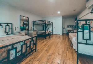Postel nebo postele na pokoji v ubytování NY Moore Hostel