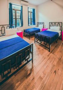 Postel nebo postele na pokoji v ubytování NY Moore Hostel