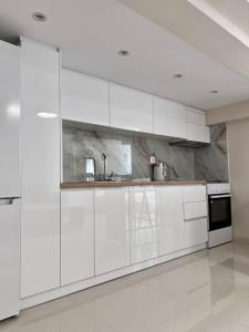 Kjøkken eller kjøkkenkrok på Minimal Cozy Apartment