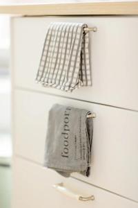 a towel hanging on a towel rack in a bathroom at Le Studio en Feronstrée in Liège