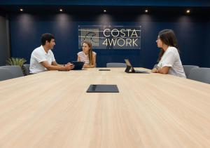 a group of people sitting around a large table at RK Farallón Canteras in Las Palmas de Gran Canaria