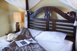 Ένα ή περισσότερα κρεβάτια σε δωμάτιο στο Rastoni Hotel Aegina