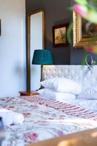 Postel nebo postele na pokoji v ubytování Boutique Hotel Museumkwartier