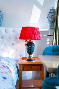 Postel nebo postele na pokoji v ubytování Boutique Hotel Museumkwartier