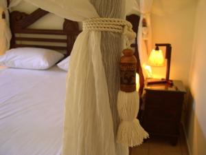 Ένα ή περισσότερα κρεβάτια σε δωμάτιο στο Rastoni Hotel Aegina