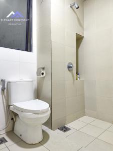 a bathroom with a toilet and a shower at 1 Tebrau By Elegant Johor Bahru in Johor Bahru
