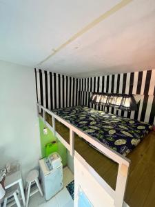 a bedroom with a bunk bed in a room at JC Unit #5 