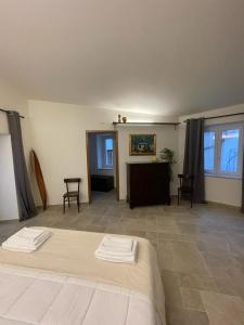 Postel nebo postele na pokoji v ubytování Baroon - Bistrot & B&B