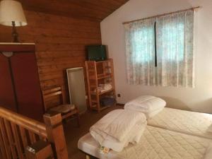 Postel nebo postele na pokoji v ubytování Appartement duplex à Châtel - 3 pièces, 6 personnes, parking couvert, proche télésiège et navettes - FR-1-198-104