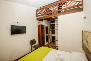 Postel nebo postele na pokoji v ubytování Pousada Caravelas de Pinzón