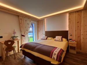 Voodi või voodid majutusasutuse Hotel Aurora toas