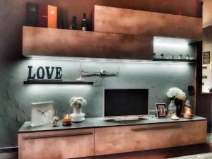 Кухня или кухненски бокс в Come a Casa Tua Luxury Apartment Centre