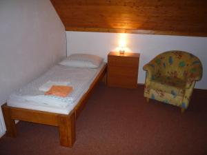 Postel nebo postele na pokoji v ubytování Apartmány U Stoiberů