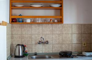 Kuchyň nebo kuchyňský kout v ubytování Giola Apartments And studios 1
