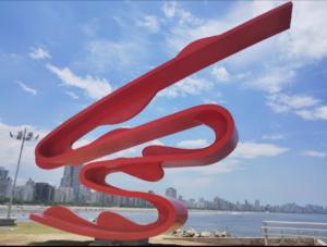 a red sculpture of a pair of tails at Apartamento Pé na Areia com Vista Mar e Wi-fi LOFTJL com 01 vaga de garagem sujeita a disponibilidade in Santos