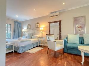 Amoris Guesthouse In Waterkloof Ridge客房内的一张或多张床位