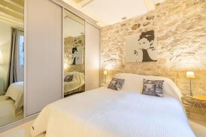 Voodi või voodid majutusasutuse Santorini toas