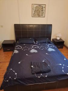 En eller flere senge i et værelse på Μονοκατοικία Μονοπήγαδο