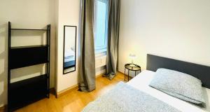 Postel nebo postele na pokoji v ubytování VIKTORIA RESIDENCE