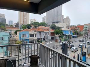 a balcony with a view of a city at VN Turiassu II in Sao Paulo