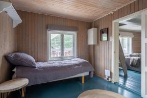 Postel nebo postele na pokoji v ubytování Vesterålen Rorbuer