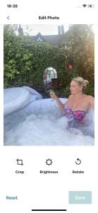 a woman is sitting in a hot tub in a pool at The Views in Church Stretton