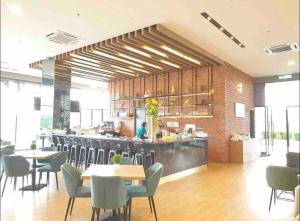 A restaurant or other place to eat at Bell Designer Suite @ KLIA Sepang