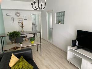 TV a/nebo společenská místnost v ubytování Departamento HOSPITAL PRIVADO - QUALITY - CORDOBA