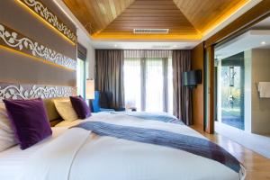 Postel nebo postele na pokoji v ubytování Dasiri Lakefront Villa