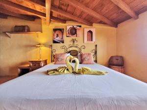 Posteľ alebo postele v izbe v ubytovaní Finca Las Madrecitas