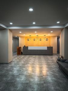 a lobby with a waiting room with a reception desk at Bakuriani Crystal Loft in Bakuriani
