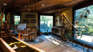 a room with a fish pond in the center of a house at Araoz de Lamadrid Wine Lodge in San Javier