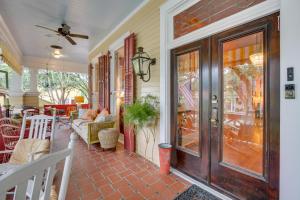 a front door of a house with a porch at Private Pool and Backyard Lavish New Orleans Haven! in New Orleans