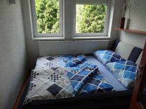 Postel nebo postele na pokoji v ubytování Chata Triomint