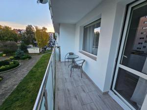 En balkong eller terrasse på Ratuszowa 6