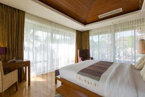 Postel nebo postele na pokoji v ubytování Dasiri Lakefront Villa