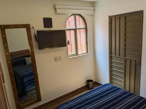 Кровать или кровати в номере Suite Nube, Experiencia Única, Nómadas Digitales, Home Office o Vacacional