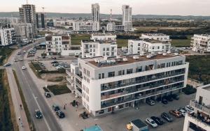 an aerial view of a city with buildings at Cosy Apartment-Marine in Rumia