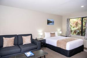 Rúm í herbergi á 58 On Cron Motel