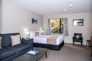 Rúm í herbergi á 58 On Cron Motel
