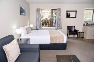 Rúm í herbergi á 58 On Cron Motel