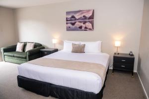 Rúm í herbergi á 58 On Cron Motel