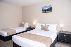 Rúm í herbergi á 58 On Cron Motel