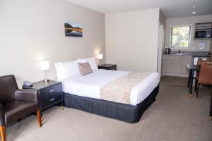 Rúm í herbergi á 58 On Cron Motel