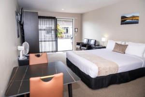 Rúm í herbergi á 58 On Cron Motel