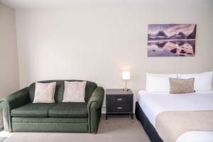Rúm í herbergi á 58 On Cron Motel